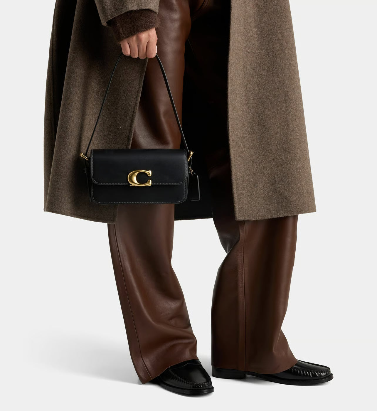 Coach Sac à main en cuir monogramme métallique