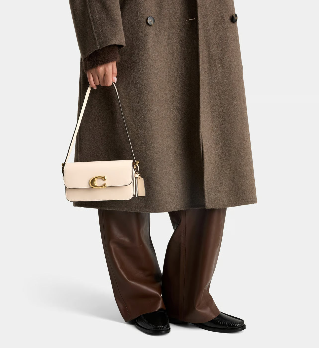 Coach Sac à main en cuir monogramme métallique