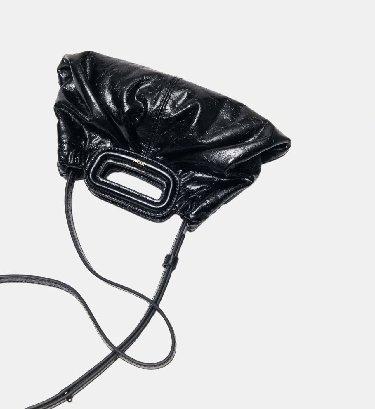 Maje Mini clutch en cuir craquelé