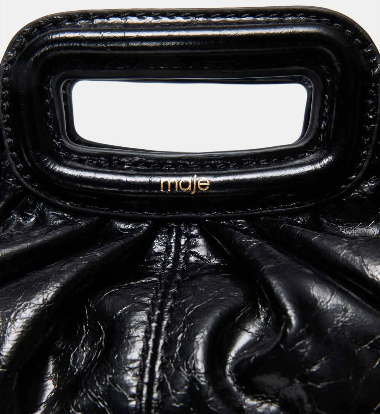 Maje Mini clutch en cuir craquelé