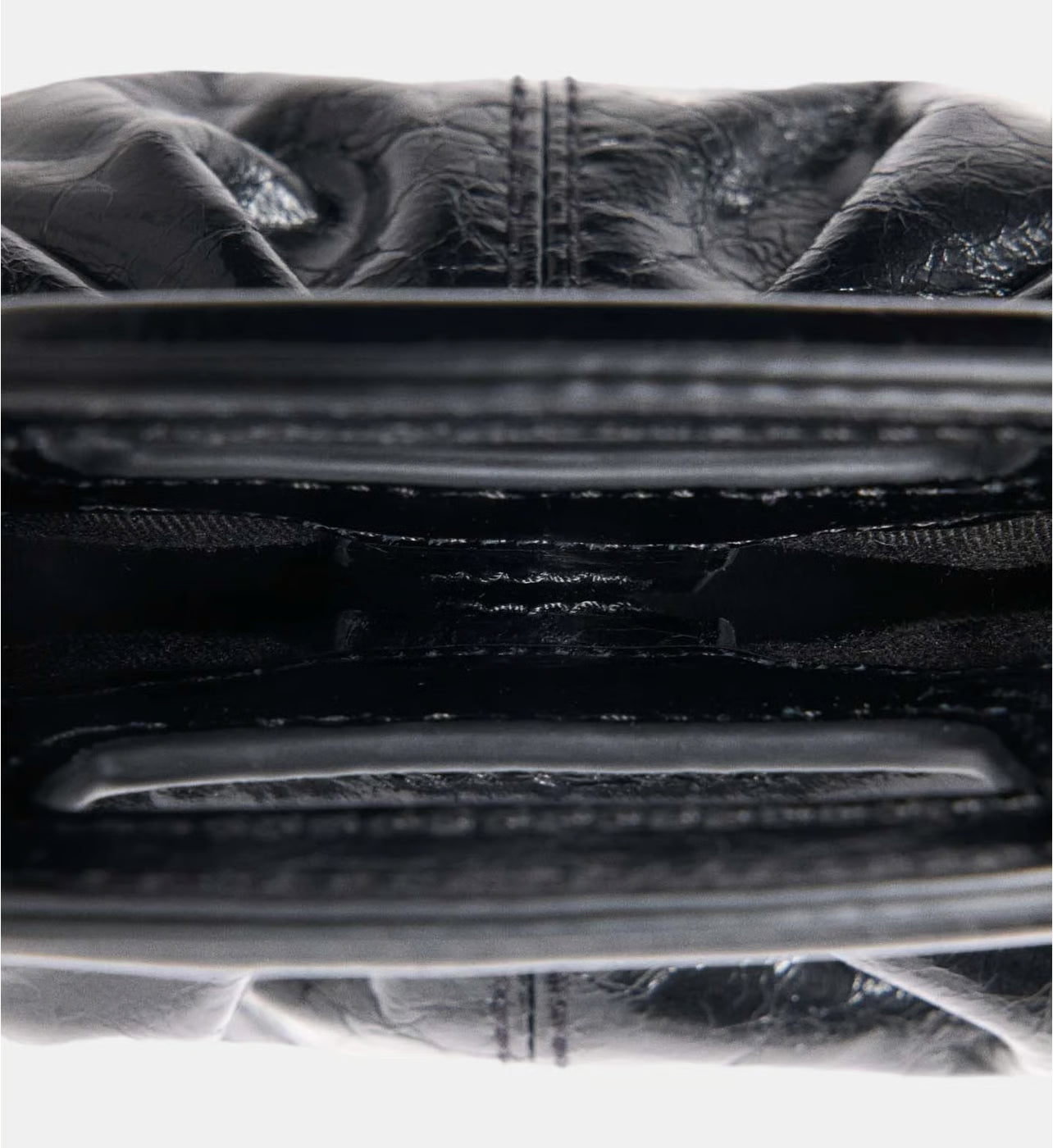 Maje Mini clutch en cuir craquelé