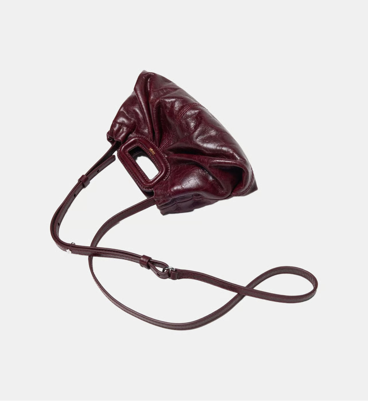 Maje Mini clutch en cuir craquelé