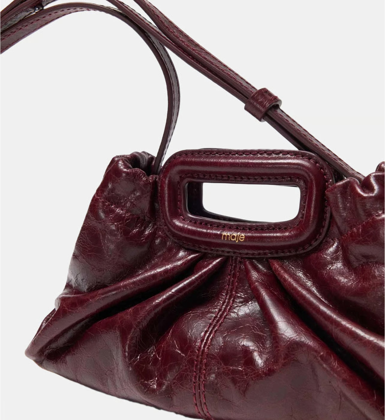 Maje Mini clutch en cuir craquelé