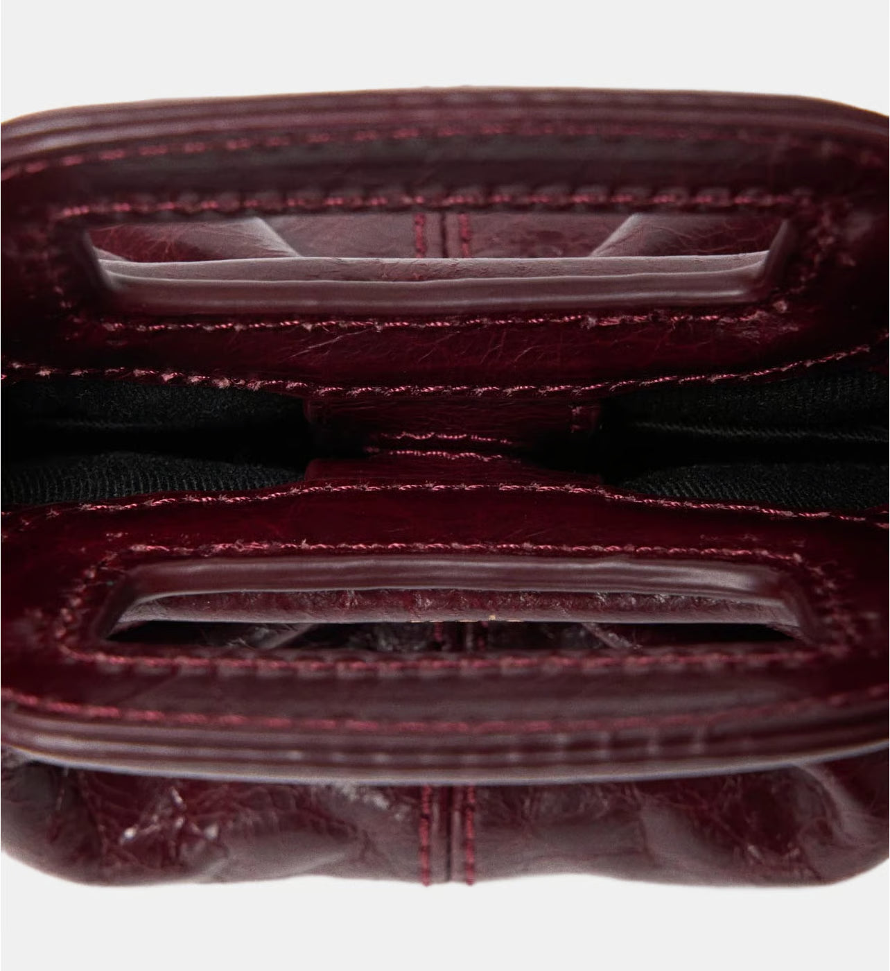 Maje Mini clutch en cuir craquelé